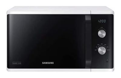 Le four à micro-ondes Samsung est blanc et dispose d'une minuterie sur le côté.