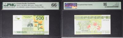 three different types of currency are on display in a display case