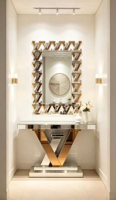 un miroir accroché au mur au-dessus d'une table dans une pièce