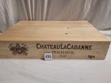 boîte en bois sur laquelle est apposée une étiquette portant l'inscription « Châteaulacabanne »