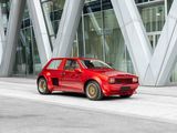 a red car that is parked in front of a building