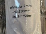 a roll of plastic wrapped in plastic on top of a wooden table