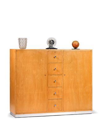 a wooden cabinet with a clock on top of it