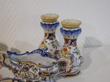 two vases that are sitting next to each other on a table