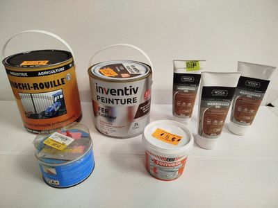 many different types of paint on the table