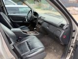 a picture of the inside of a car with the door open