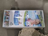 a box of wii games sitting on the ground