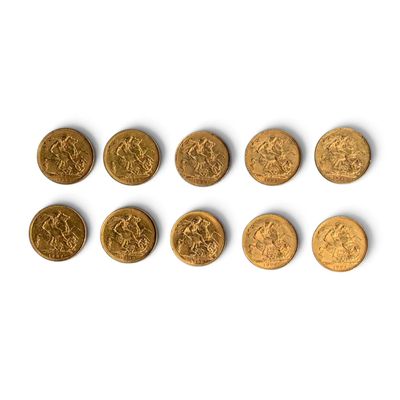 six different types of gold coins on a white surface