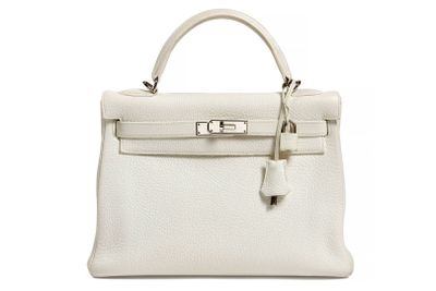 a white leather handbag on a white background