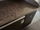 an image of a kitchen counter with a microwave above it