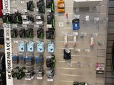 a display of cell phones and other electronics in a store