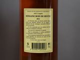 a bottle of wine that is sitting on a table