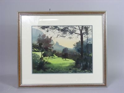 tableau encadré représentant un paysage avec des arbres et de l'herbe