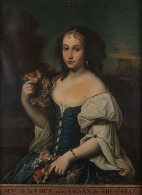 portrait of a woman in a blue dress holding a bouquet of flowers