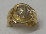 an image of a gold ring with a white diamond in it
