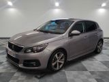 a picture of a silver car on a checkered floor