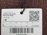 a close up of a brown sweater with a tag on it