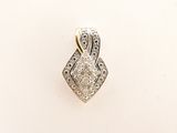 a close up of a diamond pendant on a white surface