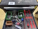 a tool box with tools in it on the floor