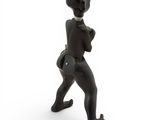 figurine of a woman walking with a purse in her hand