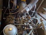 a large engine that is sitting in the back of a truck