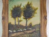 an oil painting of two trees on a wall above a dirt road