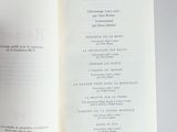someone is holding a book open to a page with a list of items on it