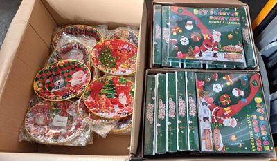 a box full of christmas cards and other decorations