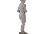 an image of a statue of a woman standing on a pedestal