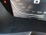 a close up of a car ' s dashboard with a speedometer