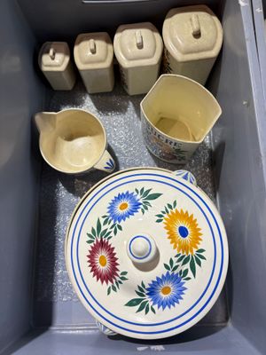 a bowl and a plate in the middle of a box