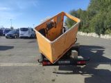 a truck that has a wooden box on the back of it