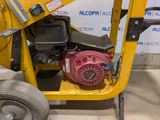 a small machine that is sitting on the ground