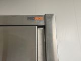 a stainless steel door with a pro inox sticker on it