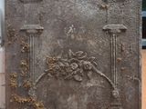 a metal plaque with a picture of a horse on it