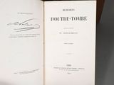 an open book with a picture of a man on it