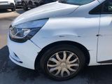 a picture of a white car parked in a parking lot