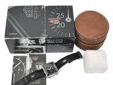 a box with a watch and a box with a watch inside of it
