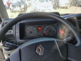 dashboard view of a car with a steering wheel and gauges