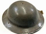 a helmet that is sitting on a white surface