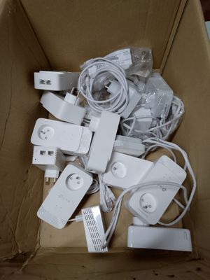 a cardboard box with a bunch of electronic devices inside of it