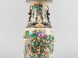 an image of a vase with a floral design on it