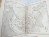 an open book with a map of the country of china on it