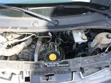 the engine of a car with its hood open and the hood open