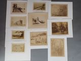 several old photos of a bunch of old buildings and trees