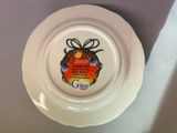 a white plate with a christmas ornament on it