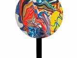abstract painting on a black stick on a white background