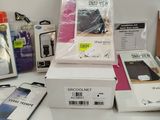 a lot of cell phones that are sitting on a table