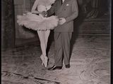 black and white photograph of a man and a woman in tutuss