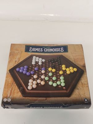 an image of a game of chinese checkers on a table